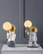 Astronaut Figure Holding the Moon Desk Lamp - My Own Cosmos