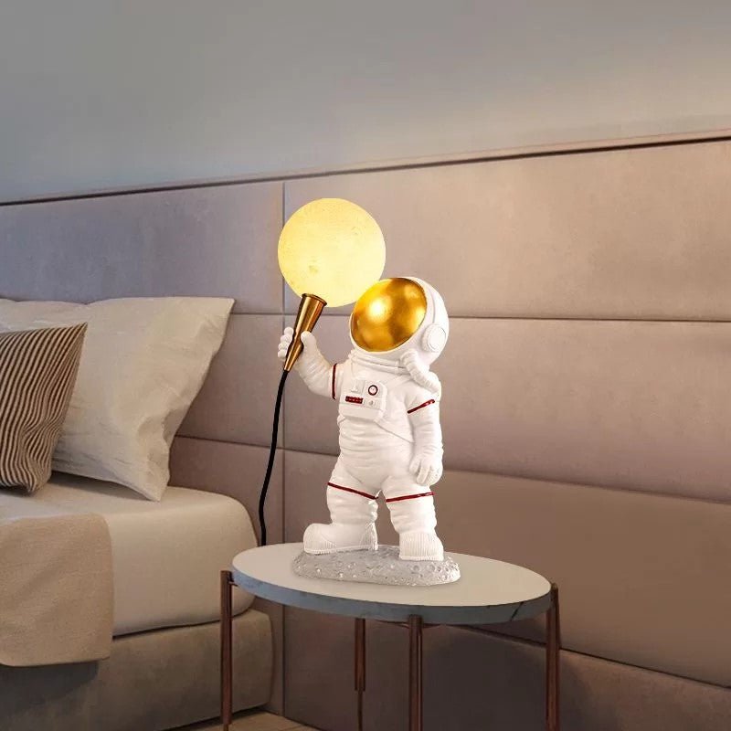 Astronaut Figure Holding the Moon Desk Lamp - My Own Cosmos