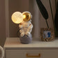 Astronaut Figure Holding the Moon Desk Lamp - My Own Cosmos